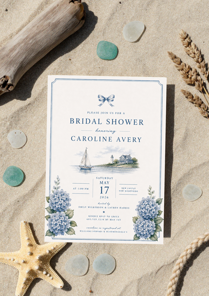 Elegant beach-themed bridal shower invitation on sandy background with shells and botanicals.